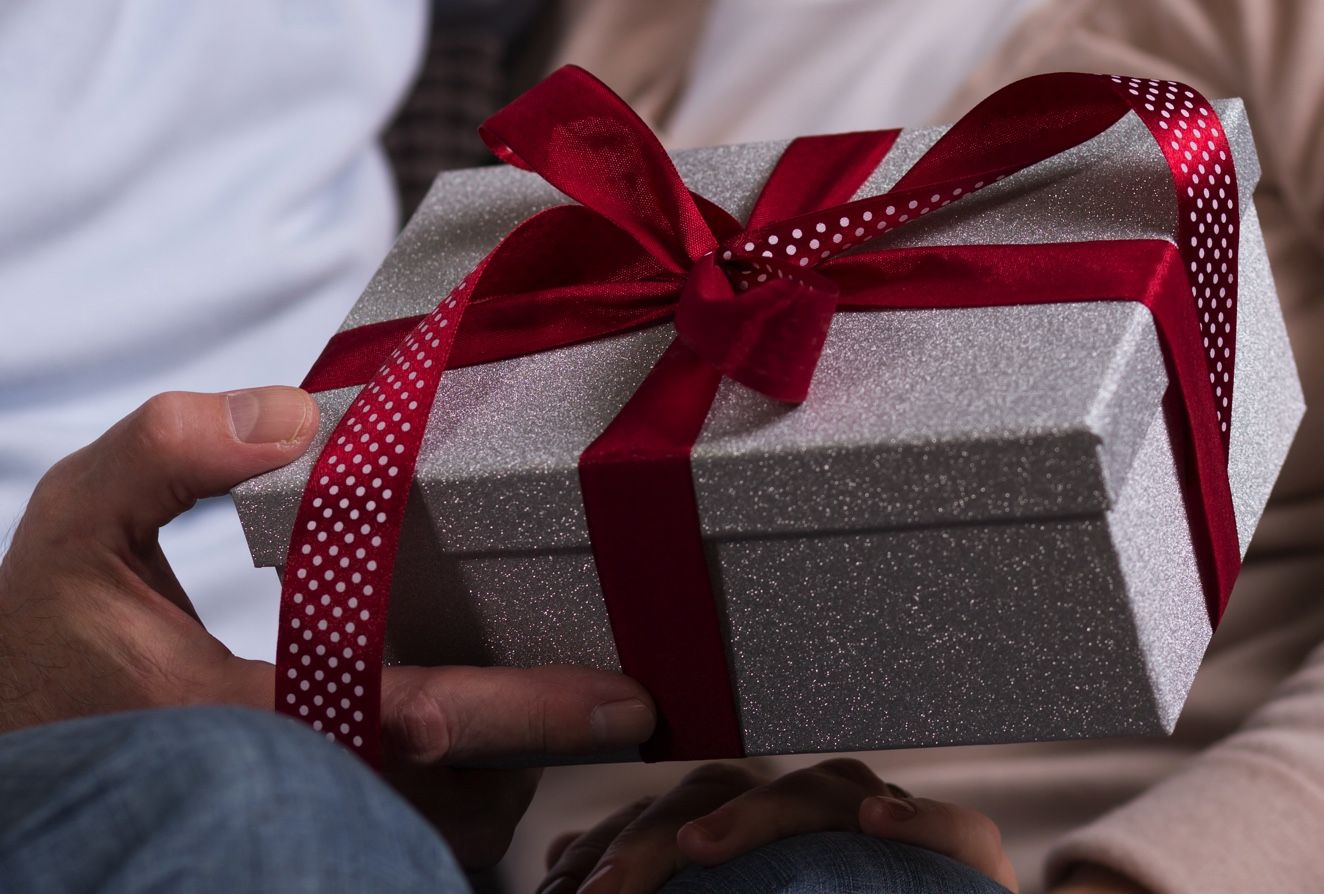 man-giving-Christmas-gift